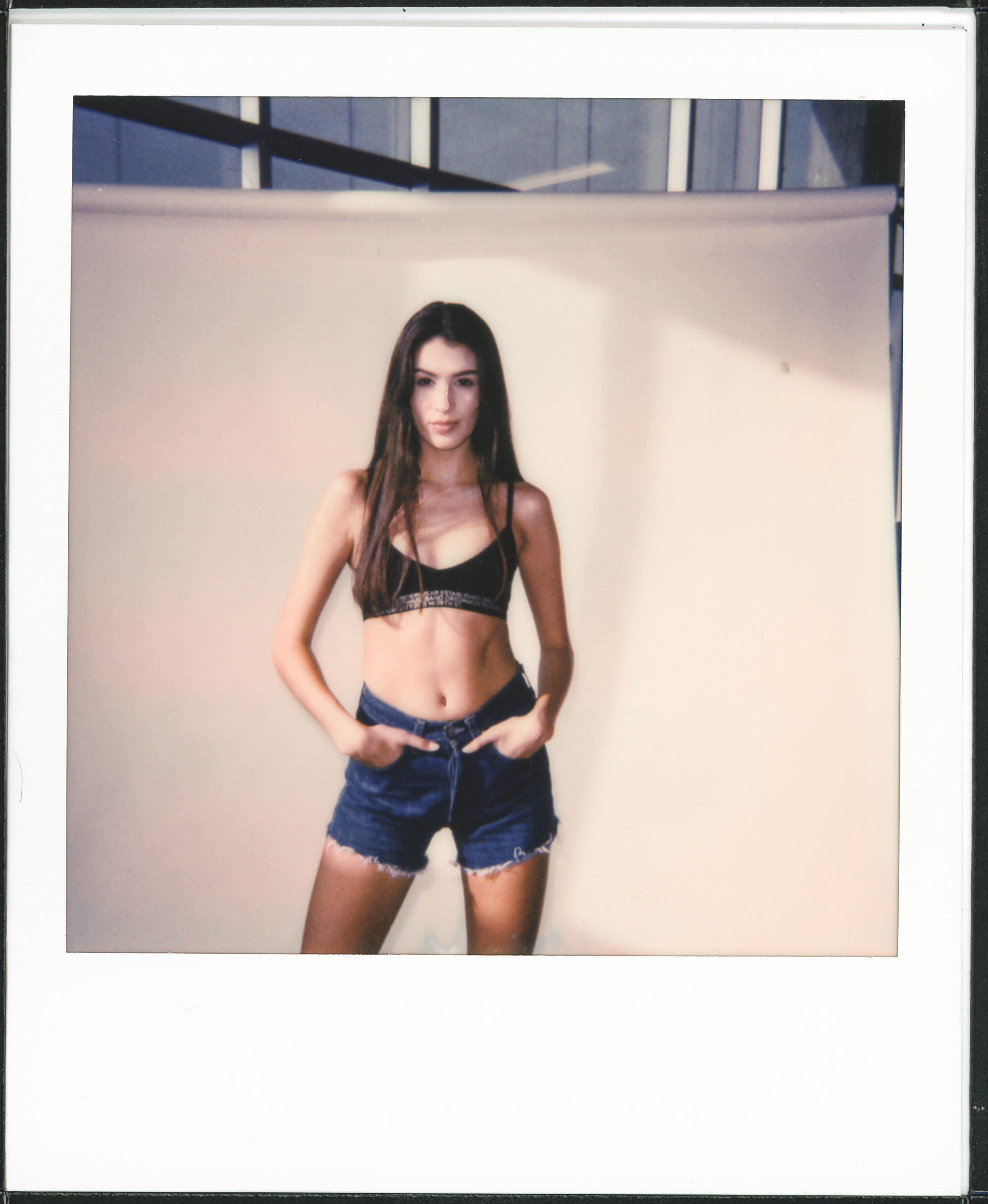 A polaroid of a female model.